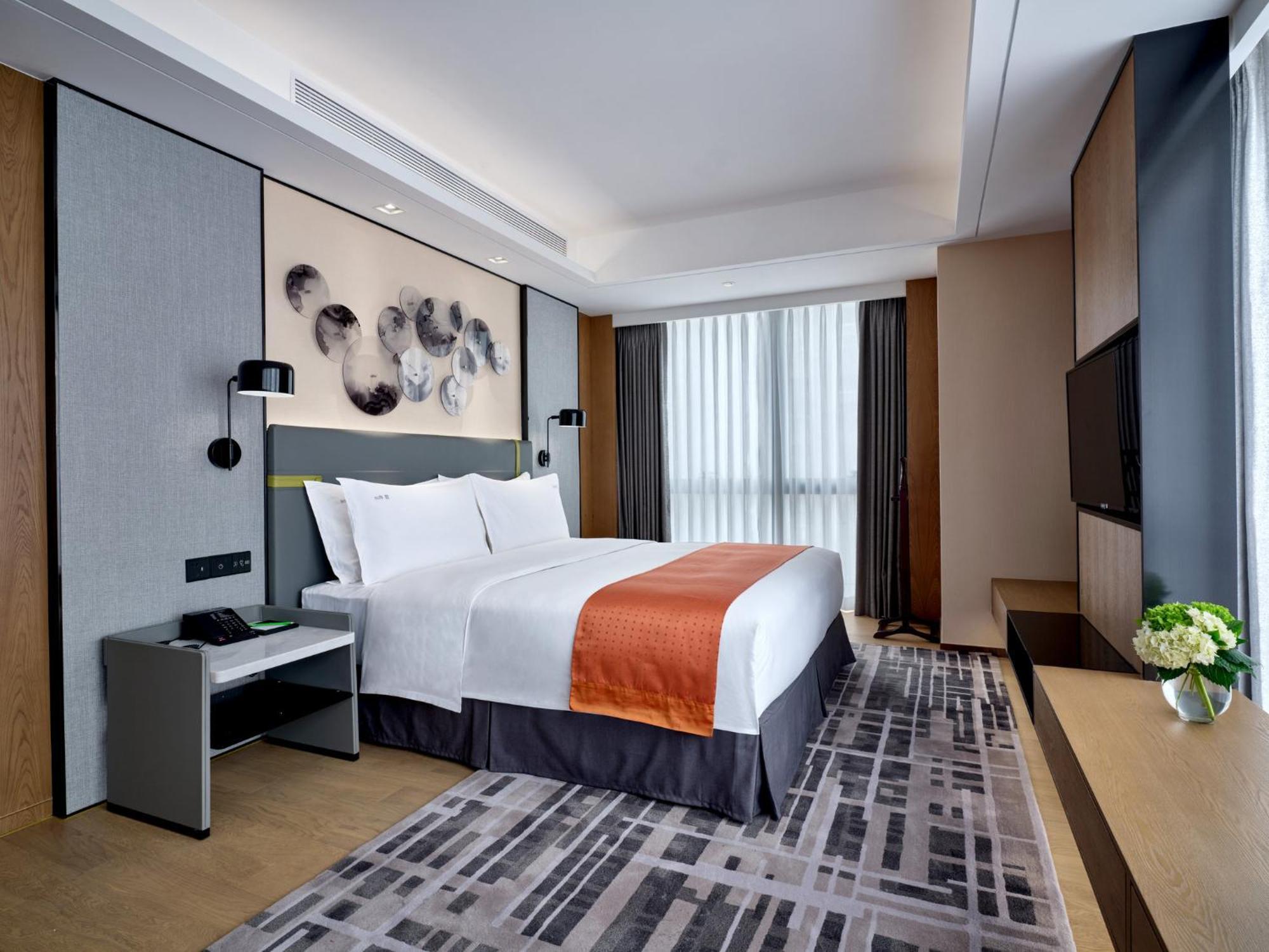 Holiday Inn Guangzhou South Lake Hotel - Ideal For Business & Leisure المظهر الخارجي الصورة